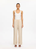 KIVARI Blythe Pant in Champagne – front-facing product photo with white tank top