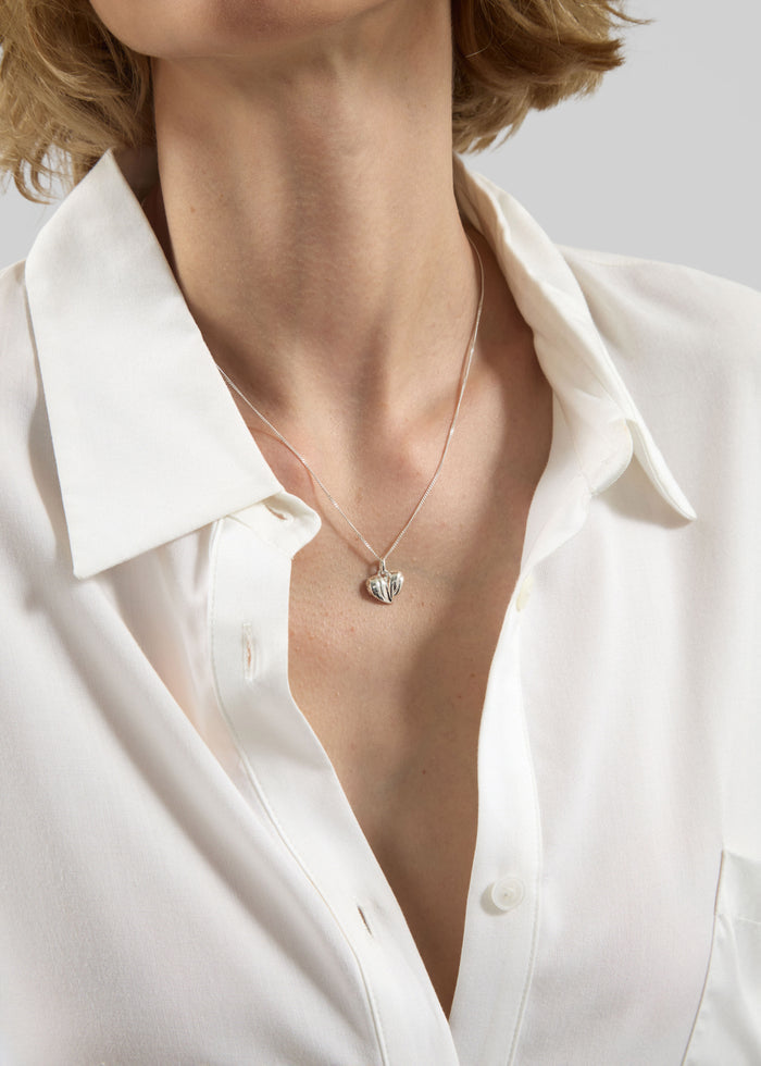 Completedworks Love Don't Lie Pendant Necklace - Silver