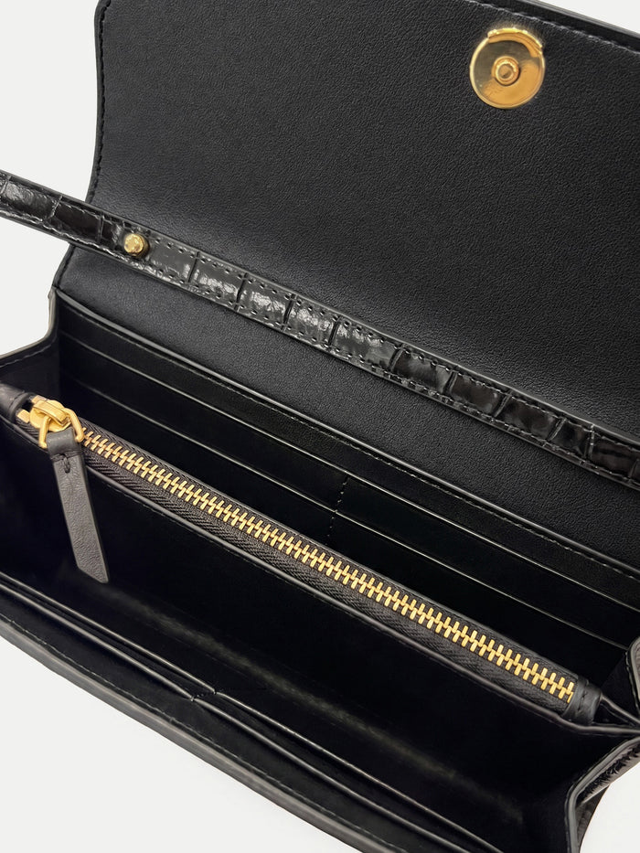 Veronica Beard Black crocodile-embossed leather wallet with gold zipper.