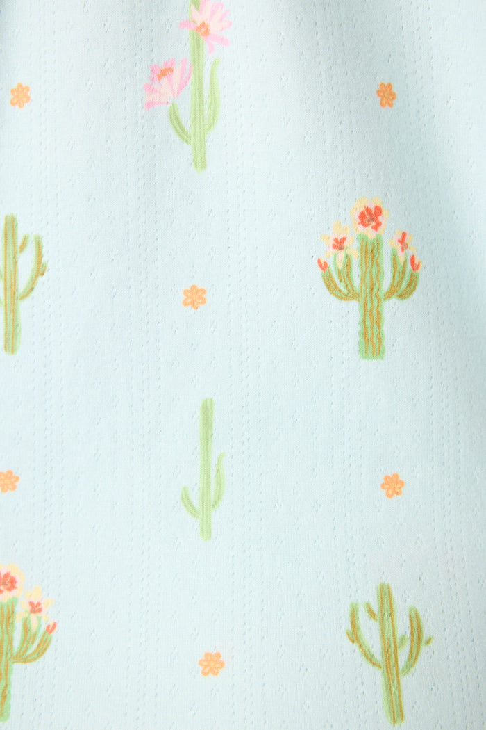 The Feelin' Prickly Cactus Blooms 3-Piece Short PJ Set by P.J. Salvage features light blue fabric with green cacti, pink flowers, and scattered orange blooms for a fun, cozy sleepwear look.