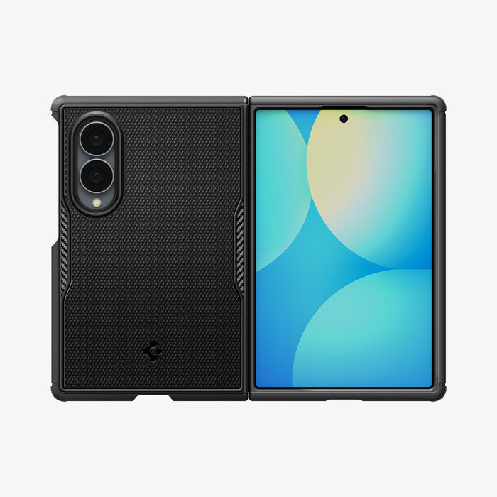 ACS11799 - Galaxy Z Fold 8 Core Armor (Mag Fit) Matte Black showing the Galaxy Z Fold 8 with the Core Armor MagFit case in Matte Black, back view folded open with the textured panel, carbon fiber accents, and screen displaying a blue and yellow gradient.