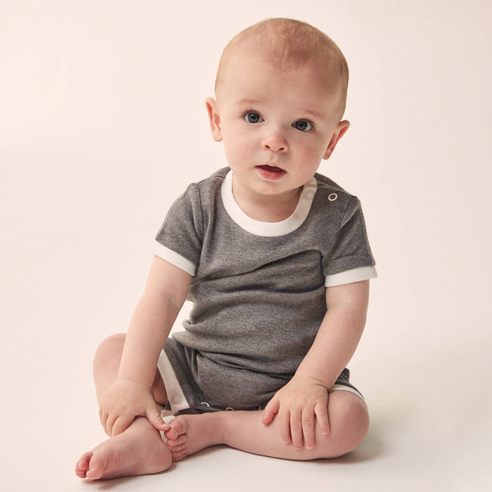 baby wearing a lunar summer sleepsuit