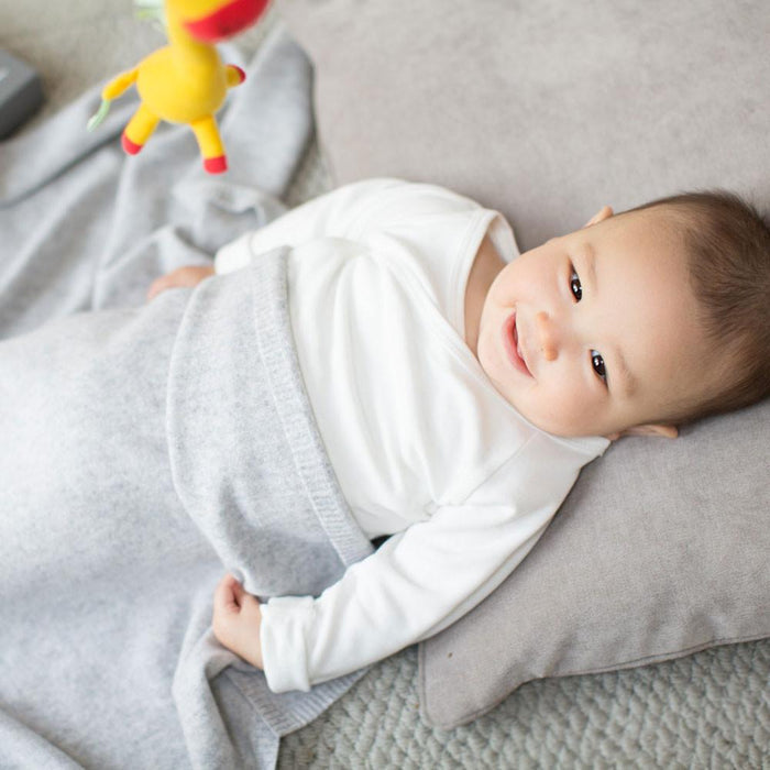 baby wrapped in a MORI´s cashmere blanket