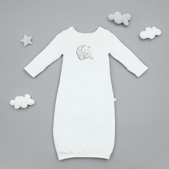 newborn baby bundler with moon print crafted from organic cotton and bamboo on a grey background