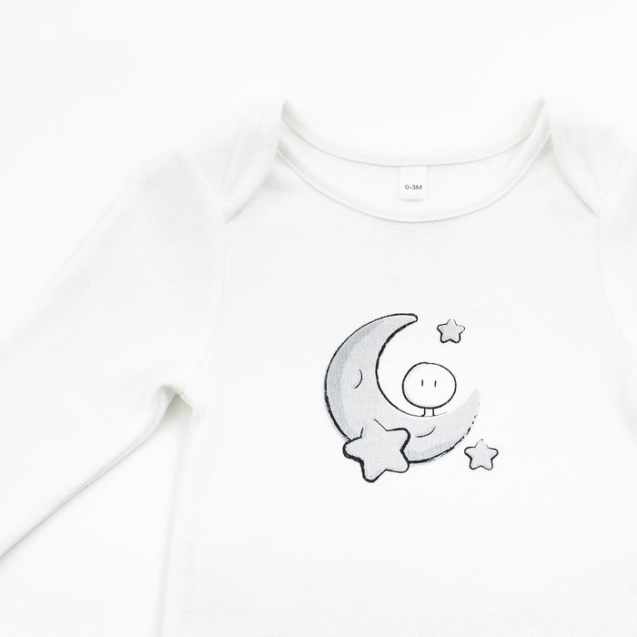 top of a newborn baby bundler with moon print