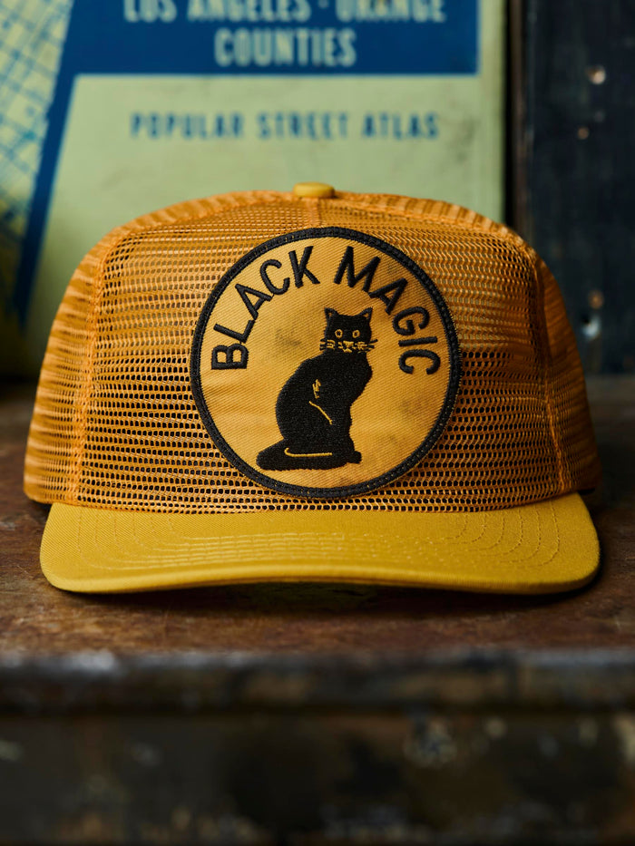 Black the "black magic" mesh trucker