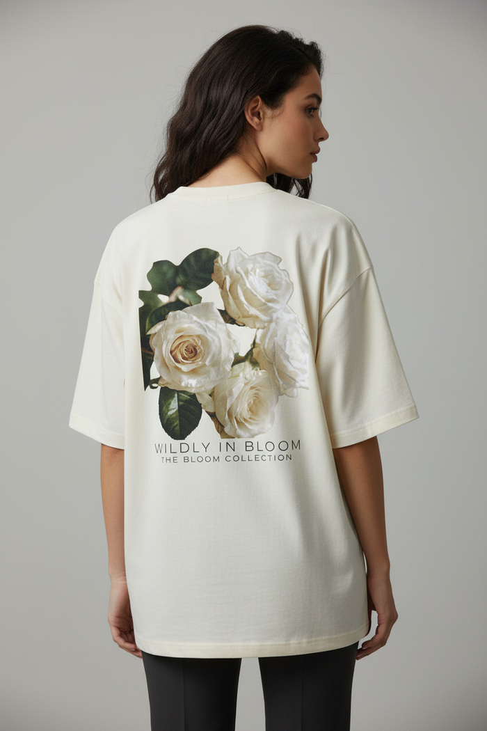 Female model back view Wildly in Bloom tee
